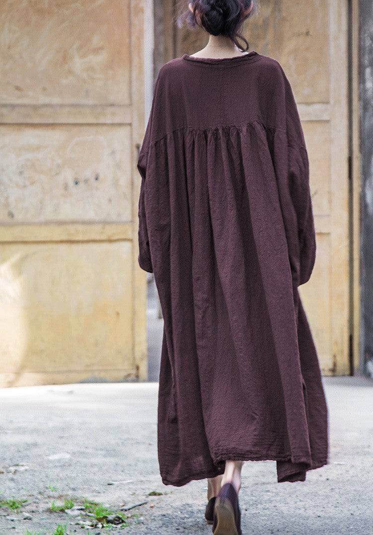 Back view of long sleeve cotton linen dress with a natural silhouette