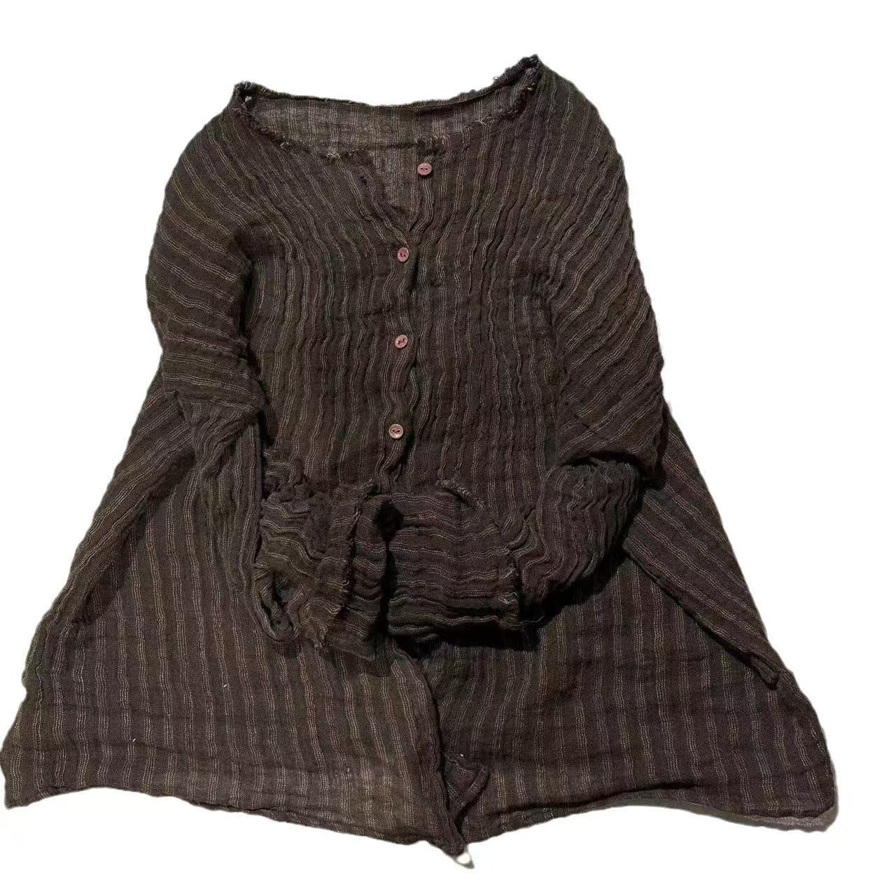 Close-up detail of retro striped linen blouse fabric and buttons
