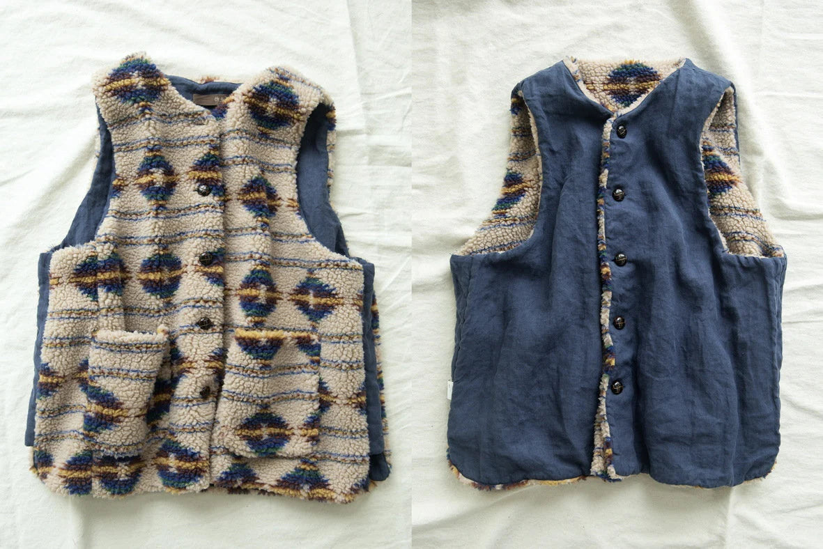 Woman wearing Vintage Cozy Faux Shearling Vest outdoors, cozy fall look