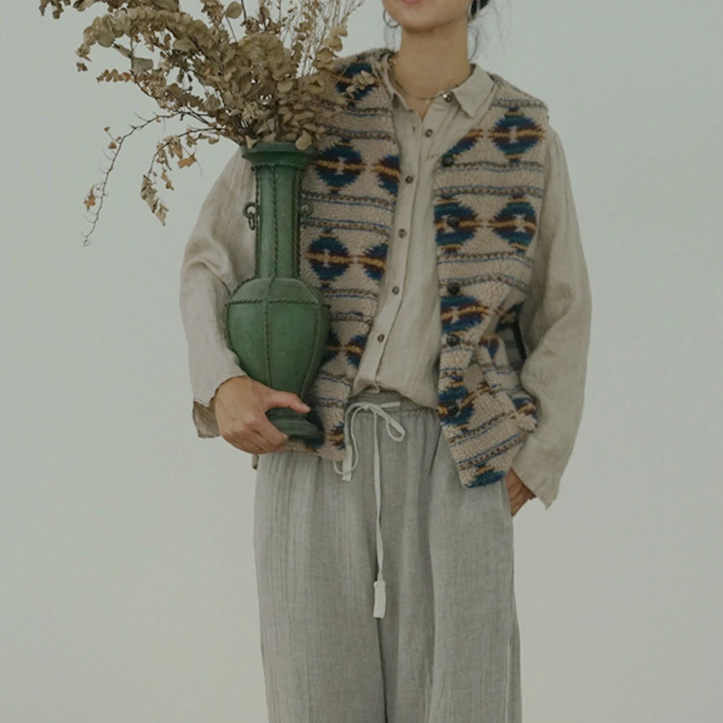 Close-up detail of soft faux shearling texture on vintage vest