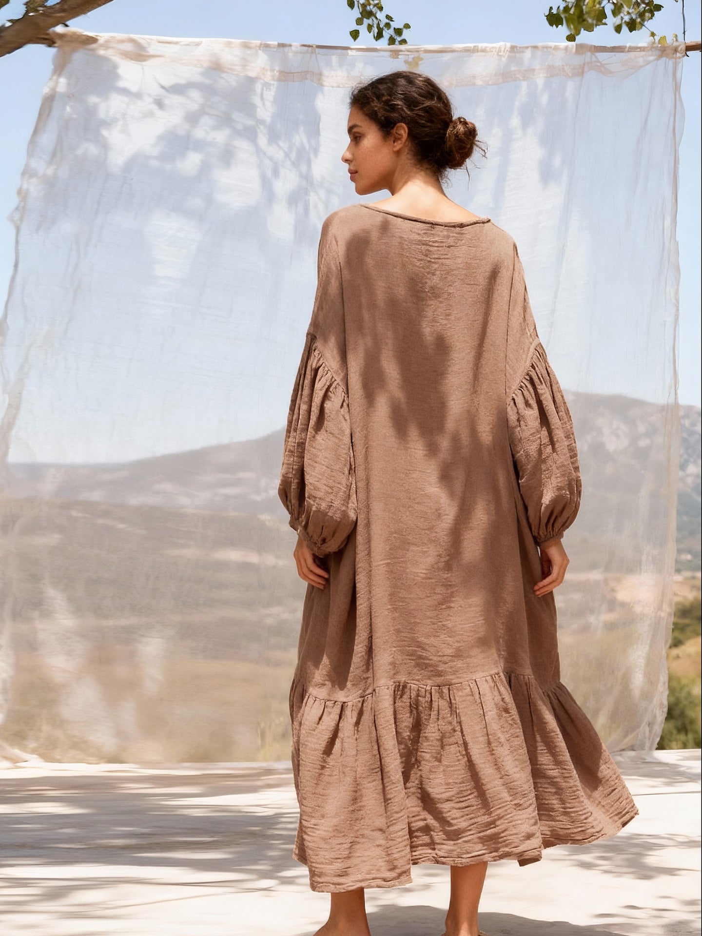 Back detail of khaki midi dress in breathable ramie fabric