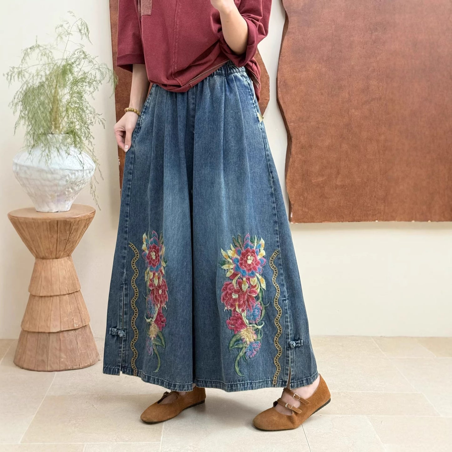 Vintage embroidered denim pants paired with a simple top for everyday styling