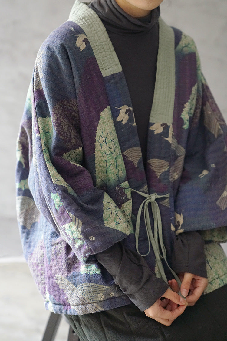 Model wearing a bohemian floral quilted kimono jacket – front view.