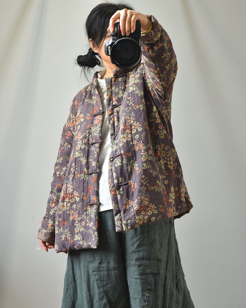 Model wearing short boho floral padded jacket
