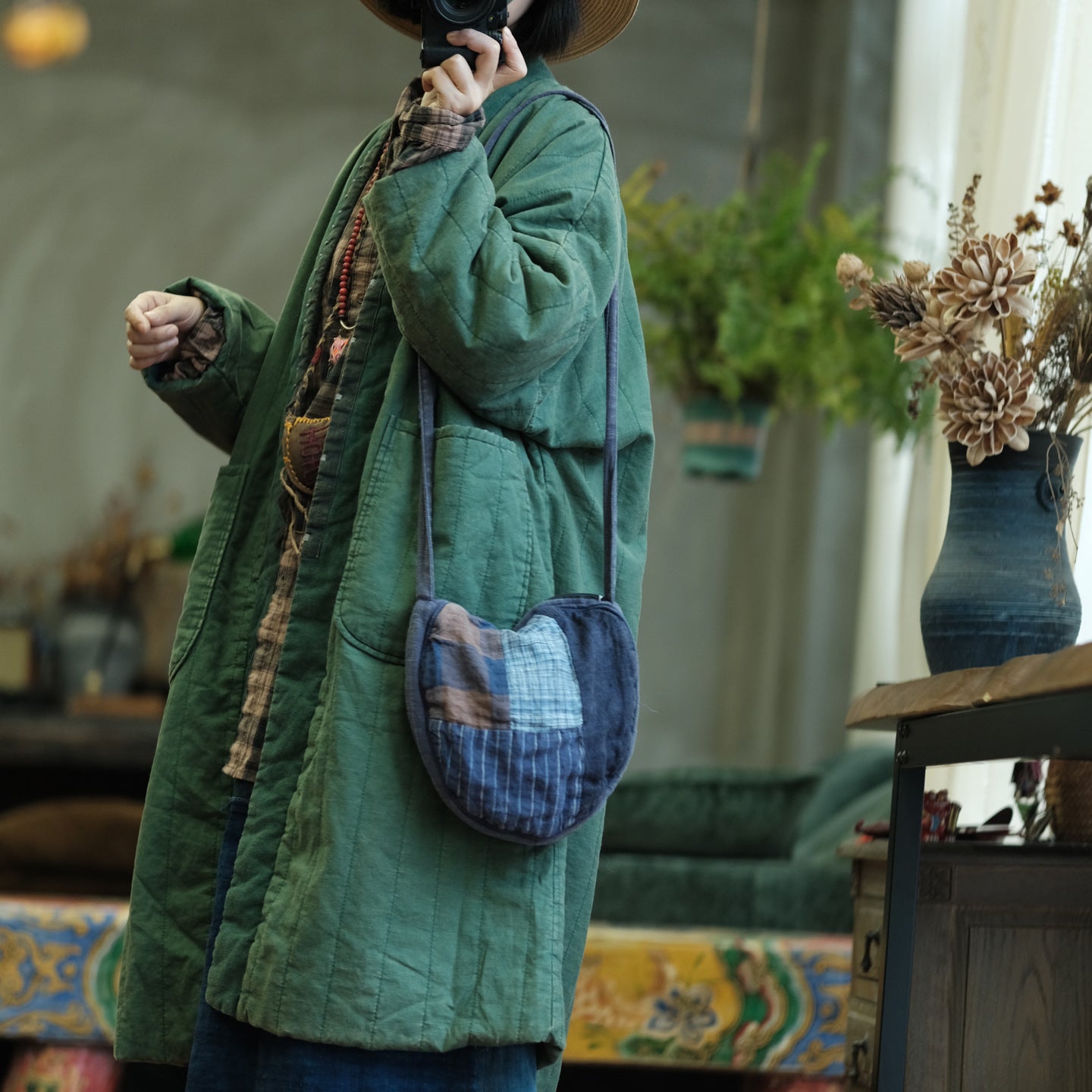 Side view of Cozy Green Quilted Jacket with padded design