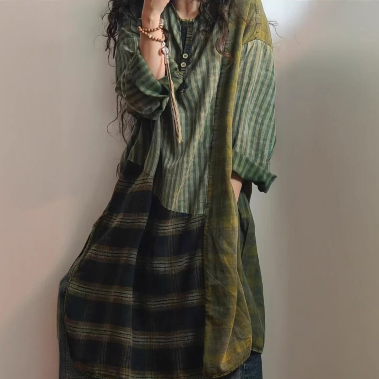 Woman wearing vintage patchwork plaid top styled casually