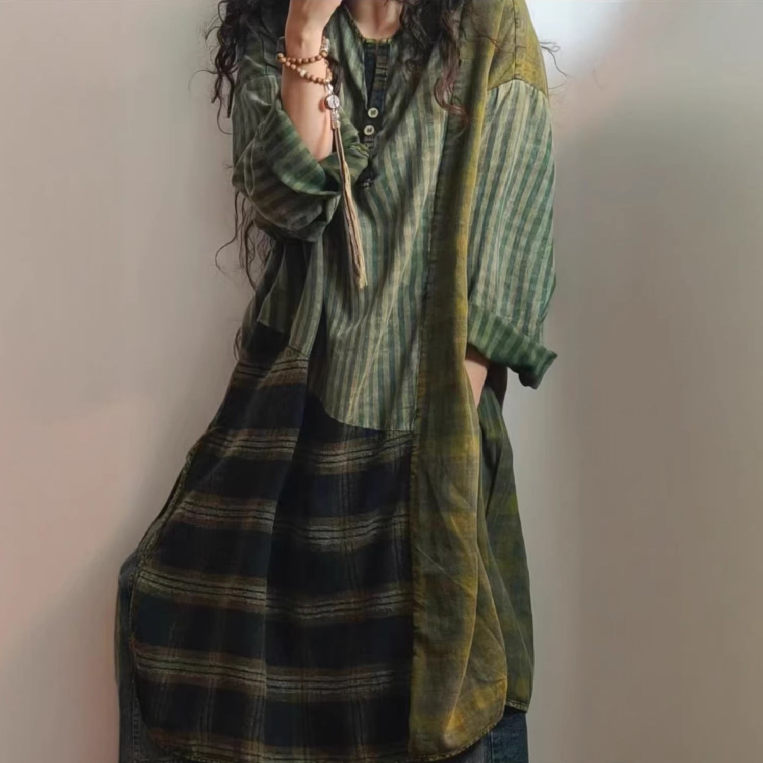 Woman wearing vintage patchwork plaid top styled casually