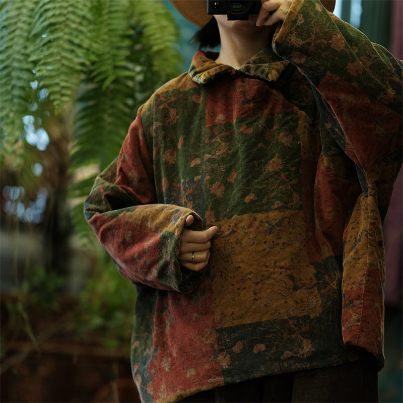 Close-up of buttoned neckline and printed quilted texture