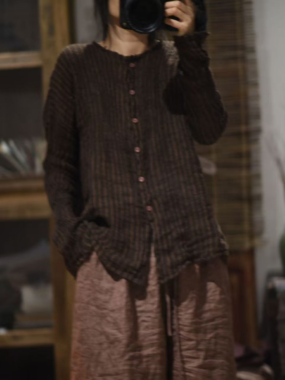 Model wearing vintage striped linen blouse casual outfit
