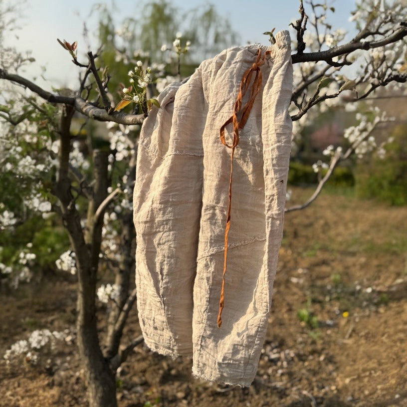Yarn-dyed linen cropped pants styled in a natural outfit